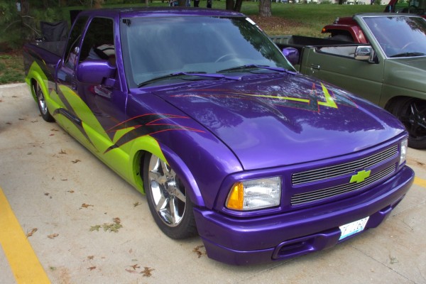 customized blue chevy s10 lowrider pickup truck