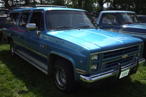 chevy suburban suv at car show
