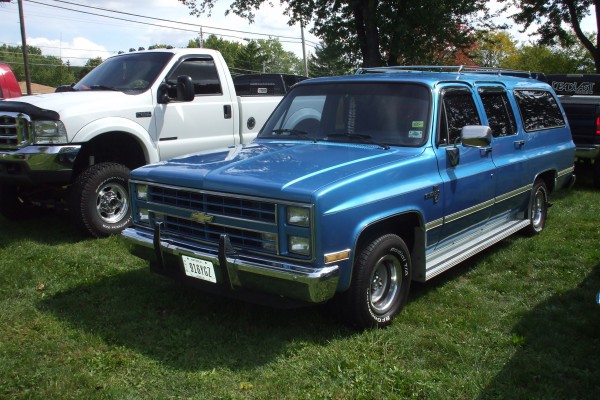 chevy suburban suv at car show