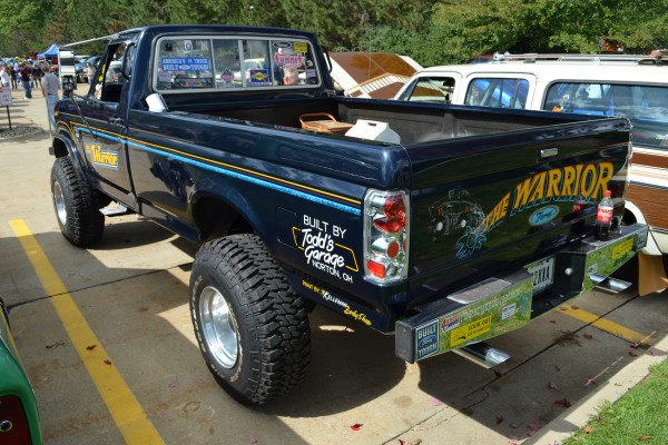 rear view of a hot rod off road ford pickup truck