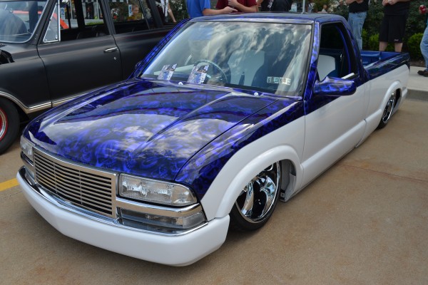 lowrider sport truck with custom paint job