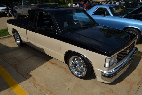 custom lowrider sport truck with wire wheels