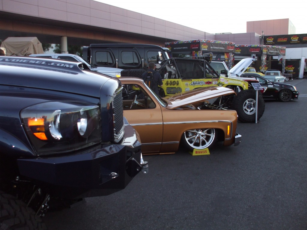 rows of show cars and trucks at SEMA 2012