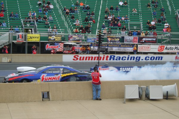 summit racing camaro doing a burnout prior to a race
