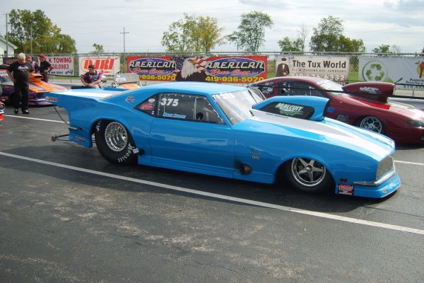 drag racers in staging lanes prior to a race