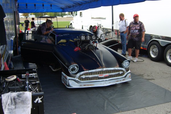 1957 chevy pro mod dragster in pits