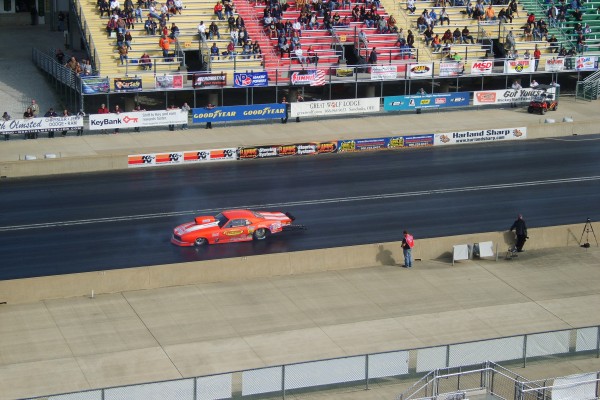 marco abruzzi's sportsman camaro racing down track