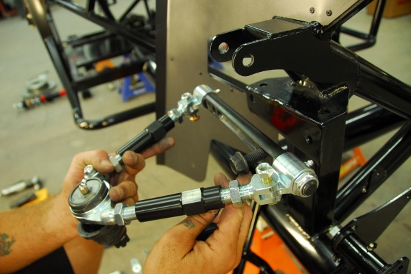 installing a-arm into a sports car suspension