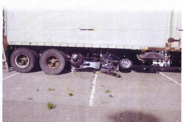 1923 Ford Model T Pickup under a semi truck after accident