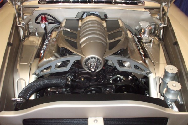 customized engine bay inside a hot rod at 2012 SEMA show