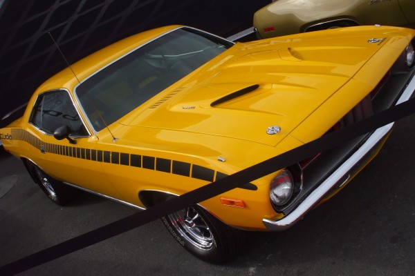yellow plymouth barracuda on display at 2012 SEMA show