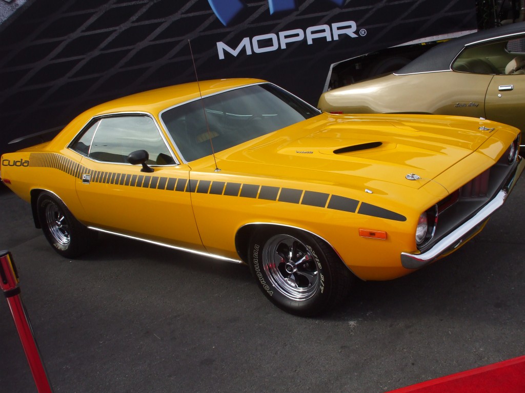 yellow plymouth barracuda 340 on display at 2012 SEMA show