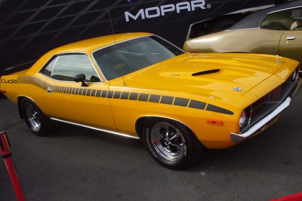 yellow plymouth barracuda 340 on display at 2012 SEMA show