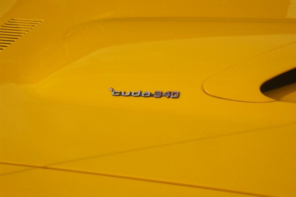 cuda 340 emblem on the hood of a plymouth