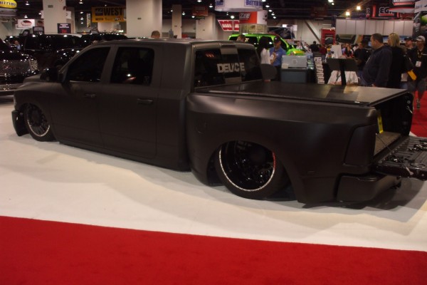 lowered late model dually truck on display at 2012 SEMA show