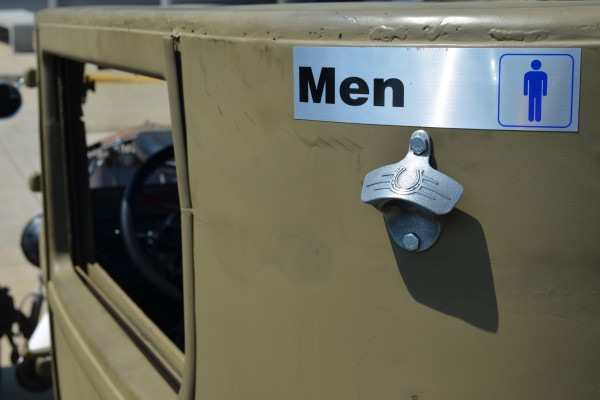 men's room sign on a 1924 Rat Rod