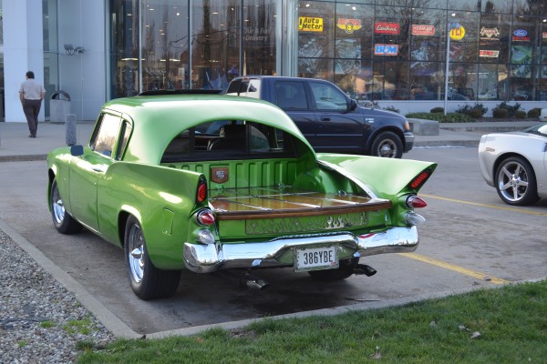 rear quarter view of a Studebaker golden hawk with custom truck bed