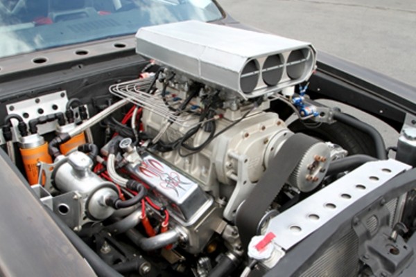 first-gen chevy chevelle muscle car with blown v8 engine