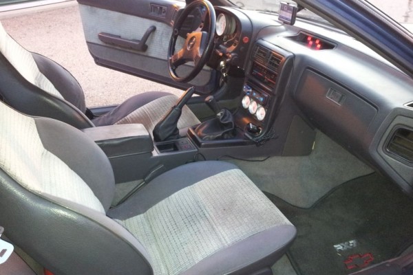 interior of a mazda RX-7 with SBC V8 Swap