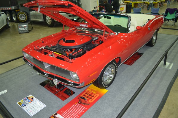 red 1970 plymouth hemi cuda convertible at car show
