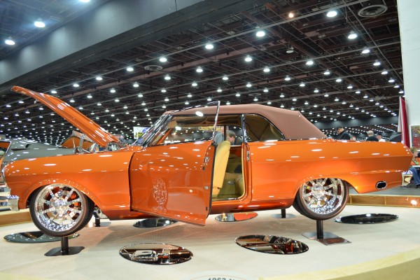 custom convertible muscle car in a car show display