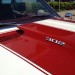 close up of 302 emblem on hood of a chevy camaro z/28 thumbnail