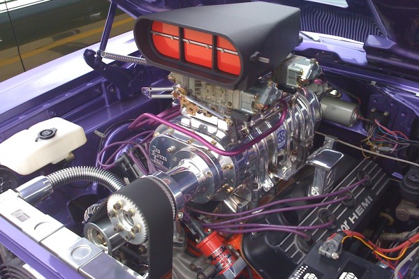 supercharged blown hemi v8 engine in an old mopar