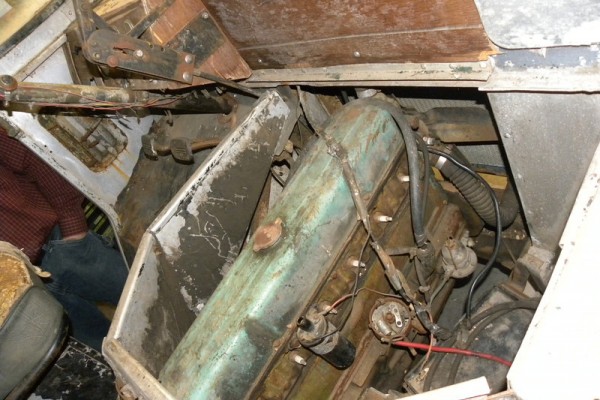 inline six chevy engine in an old delivery truck