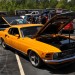 orange 1970 ford mustang with custom wheels thumbnail