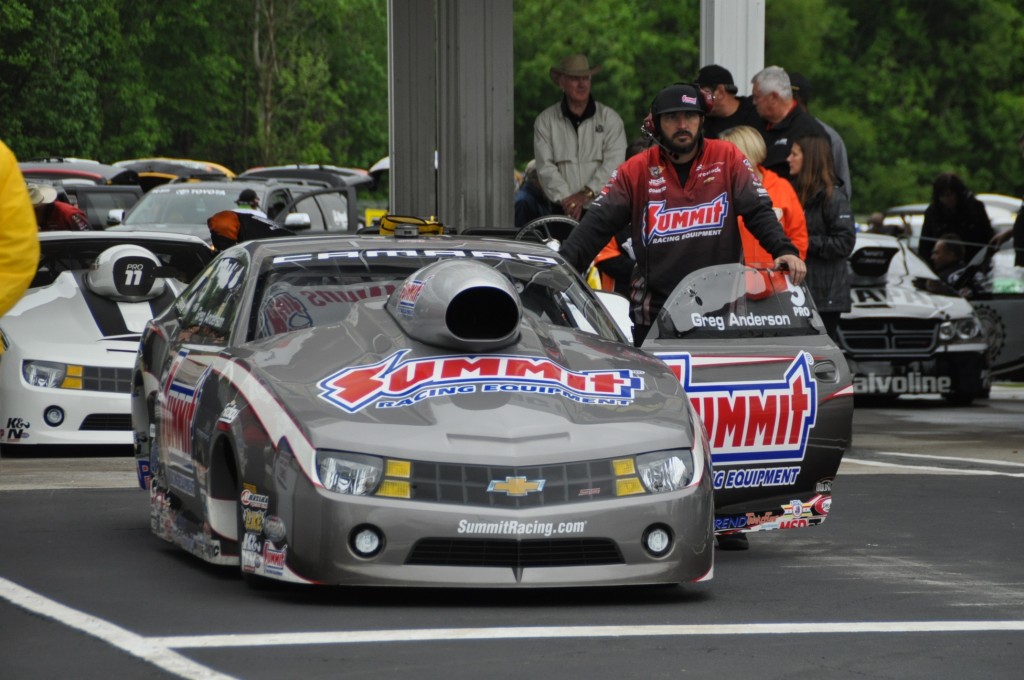 Greg anderson waits in his pro stock nhra Camaro, 2013