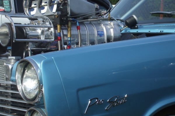 pro street badge on a supercharged muscle car