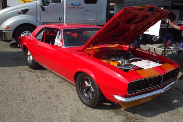 red 1967 chevy camaro drag car