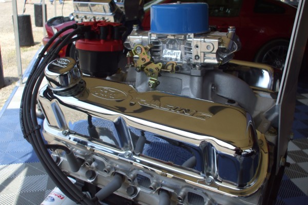 ford crate motor in an automotive trade show display