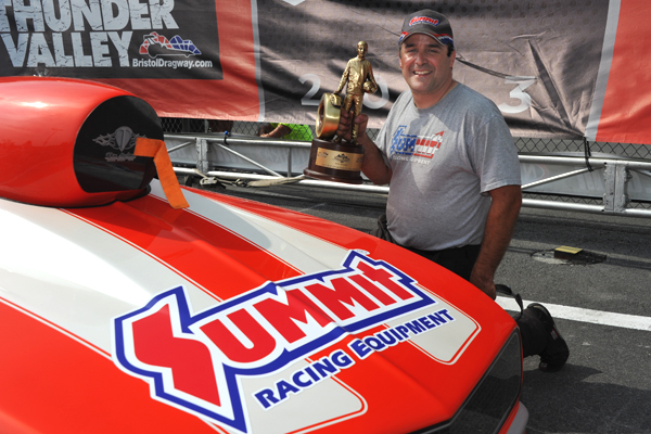 marco Abruzzi with nhra wally trophy and camaro