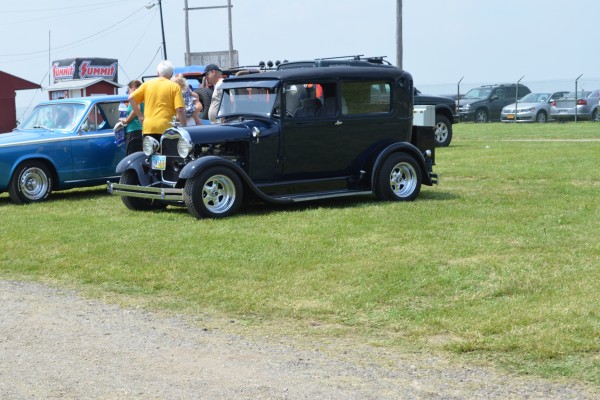 vintage hot rod at a car show
