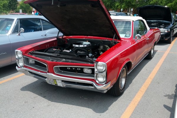 red 1966 pontiac gto convertible on hot rod power tour