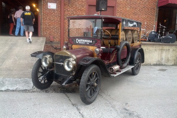 vintage white brass era delivery truck