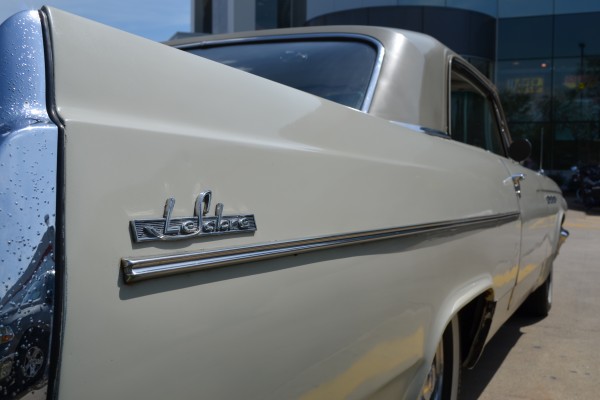 close up on rear fender emblem on a 1963 Buick LeSabre