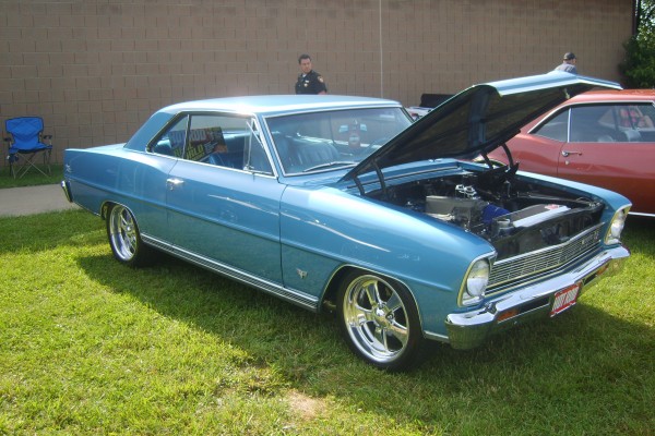 blue chevy 2 nova with custom wheels