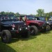 row of jeep wranglers at a car show thumbnail