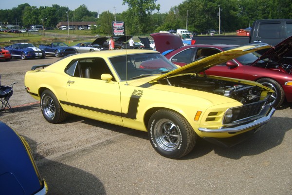 Yellow ford mustang boss 302 at super summit 2013