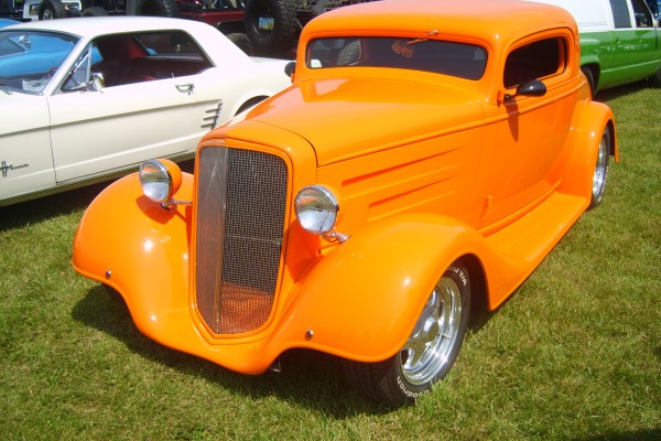 orange fendered ford hotrod with chopped roof