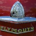 ship emblem hood ornament of a vintage antique plymouth coupe thumbnail