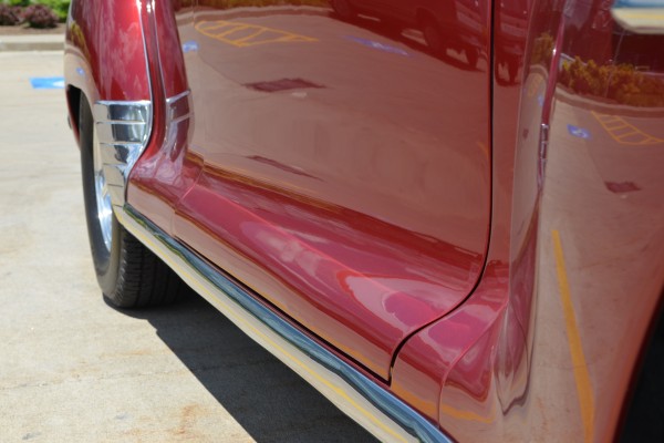rear rocker and door seam view of a antique plymouth coupe