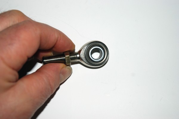 man holding a rod end