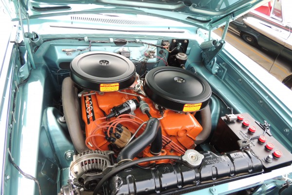 426 engine in a classic mopar with cross ram intake