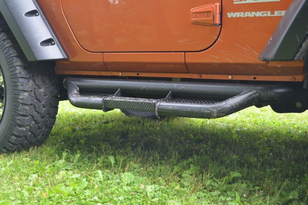 custom step bar rock sliders on a jeep wrangler JK