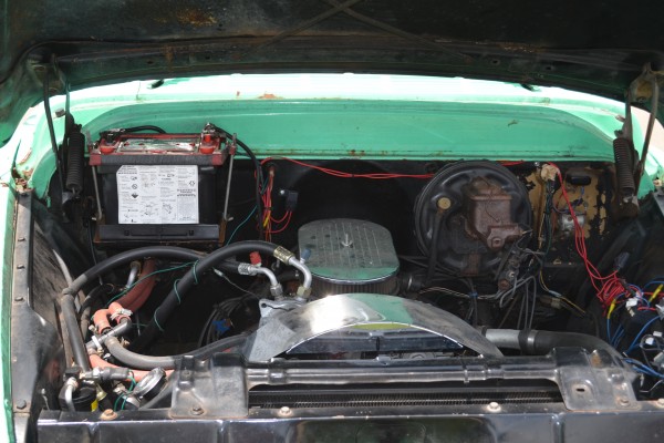 turquoise hot rod chevy pickup truck, engine bay