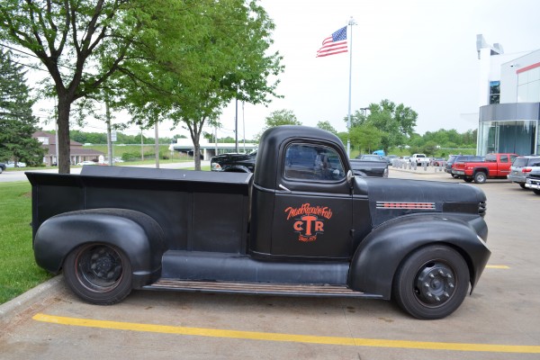 side profile view of a vintage dually hot rod truck at summit racing