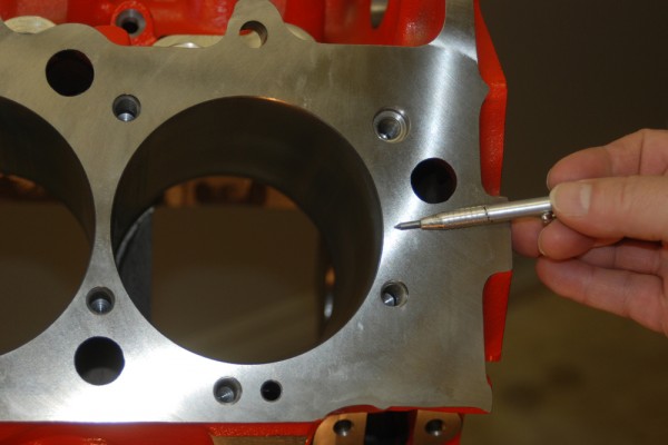 pointing to cylinder bore on a big block chevy engine block